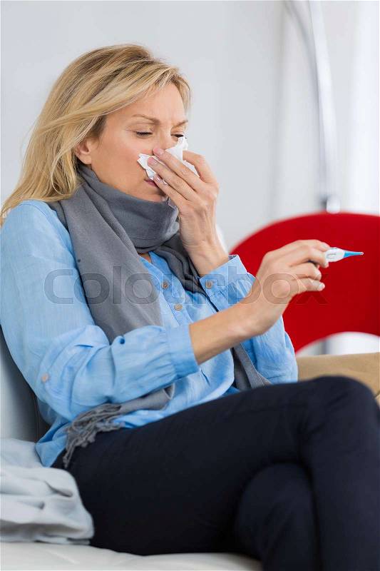 Sick woman sneeze, stock photo