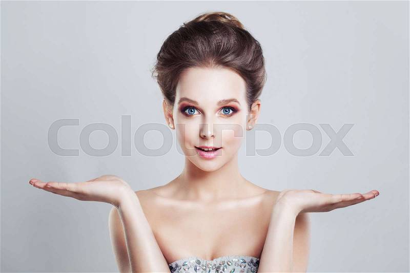 Pretty Woman Showing her Opening Hands. Choice concept, stock photo