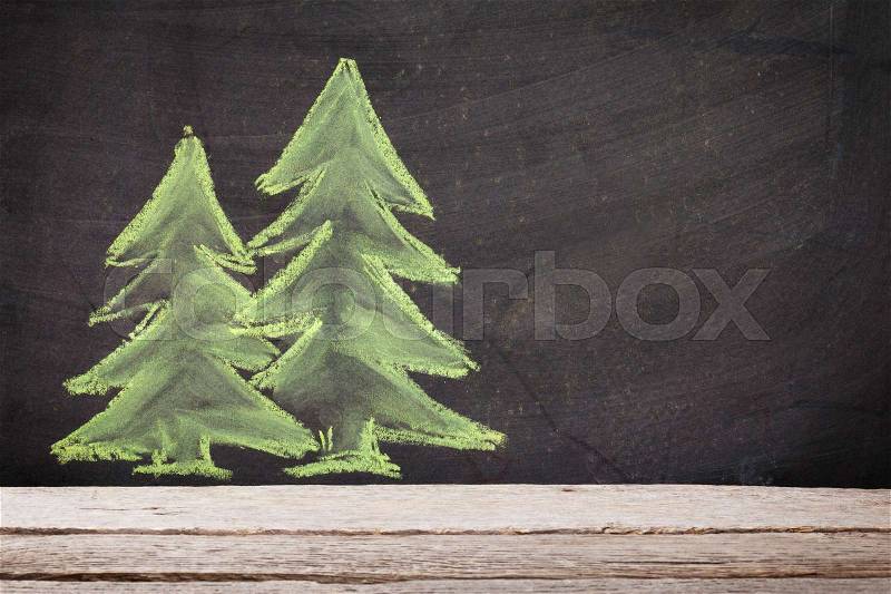 Christmas hand drawn xmas fir tree on chalk board with copy space, stock photo