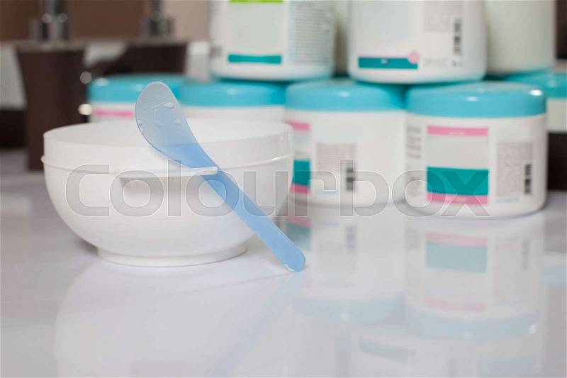 Set of different cosmetic products for beauty treatment. Banks and bottles with cosmetic creams for beauty and health care, stock photo