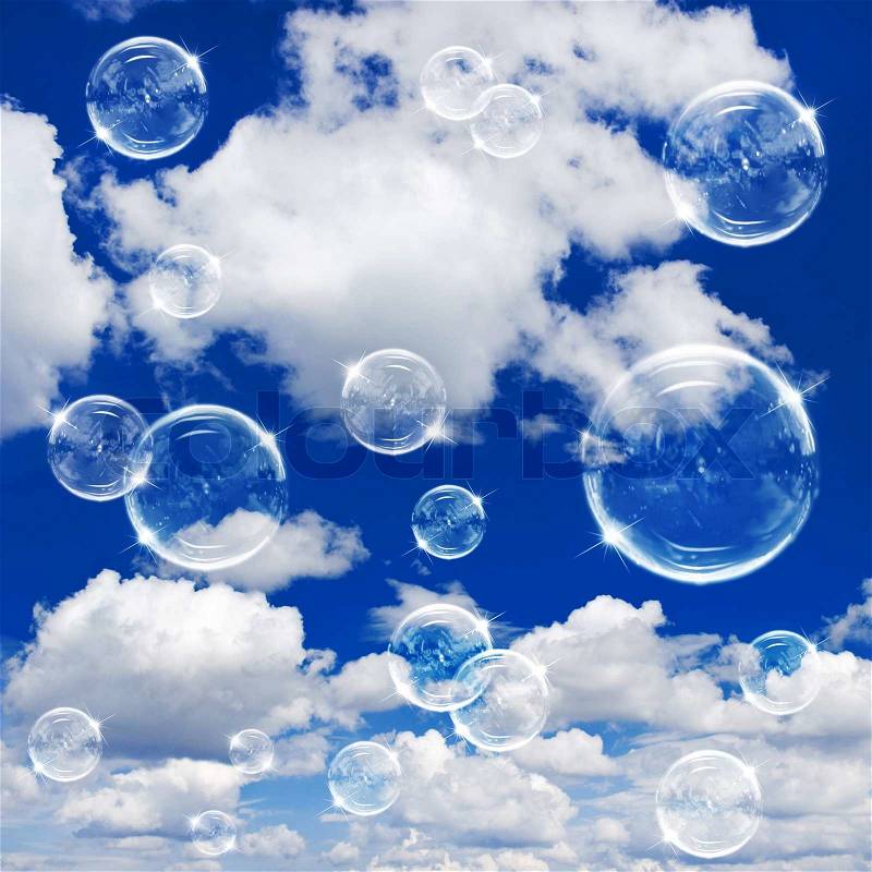 Soap bubbles on cloudy sky background, stock photo