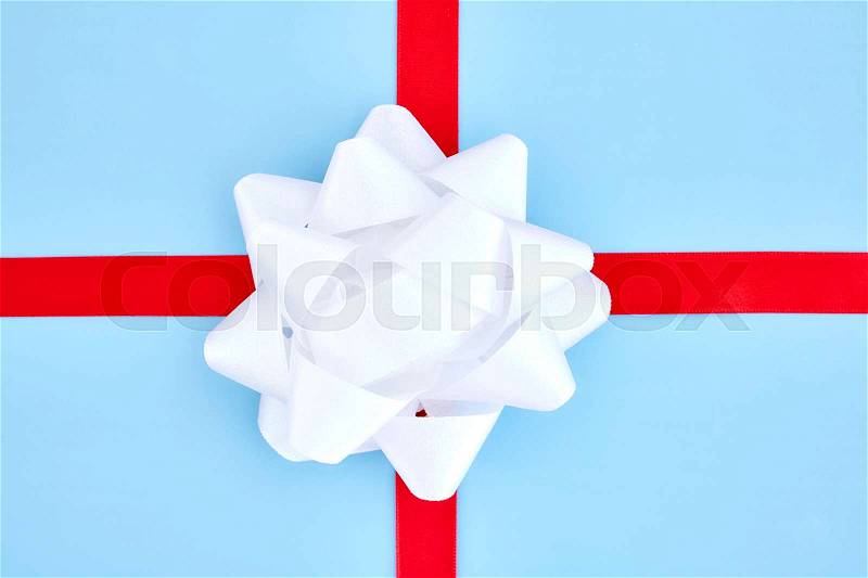 A studio photo of a gift wrapped in cellophane, stock photo