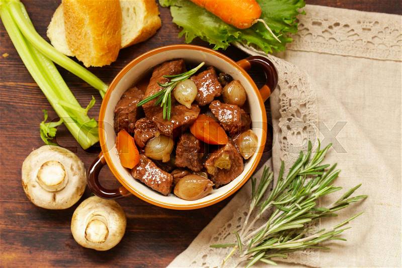 Traditional beef goulash - Boeuf bourguigno. Comfort food. Stew meat with vegetables, stock photo