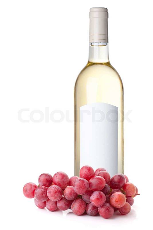 White wine in bottle with blank label and red grapes Isolated on white ...