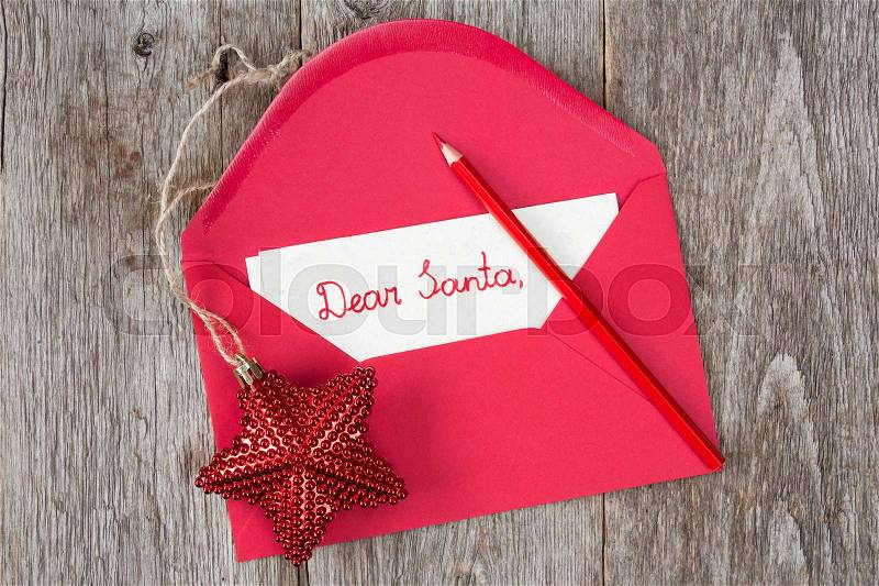 Christmas star and envelope with child\'s letter to Santa , stock photo