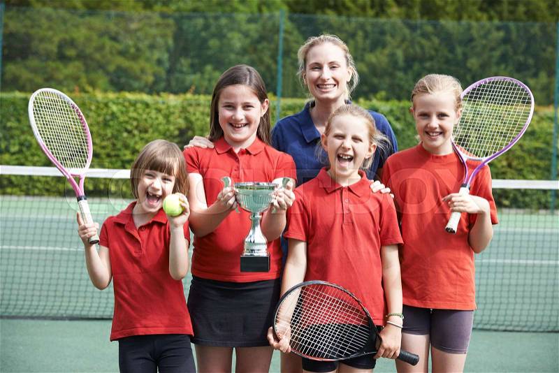 Victorious School Tennis Team With Trophy , stock photo