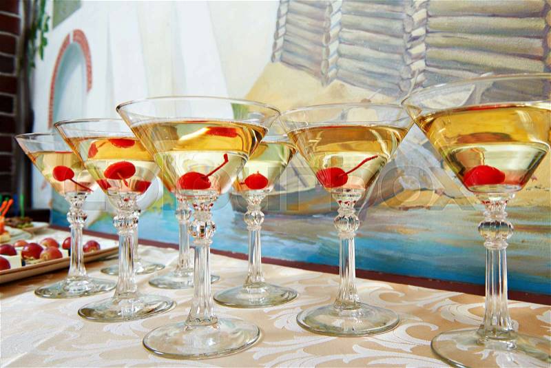 Martini glasses and cherries on the holiday party, stock photo