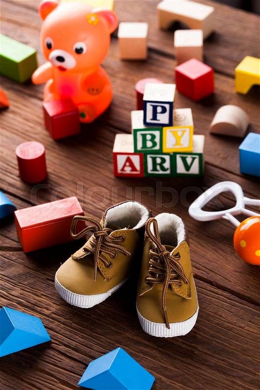Children\'s of toy accessories on wooden background, stock photo