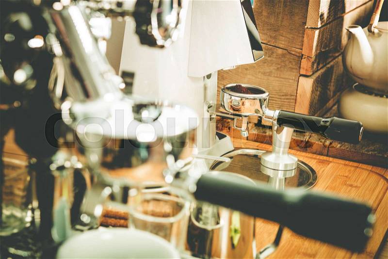 Coffee Making Equipment Closeup Photo. Elegant Shiny Coffee Maker and Grider, stock photo