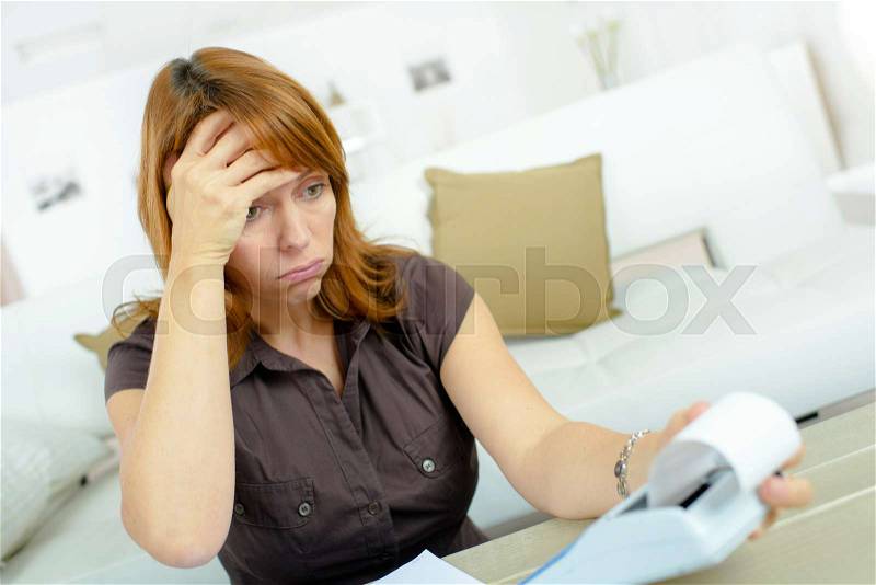 Closeup portrait shocked surprised funny looking stressed woman financial crisis, stock photo
