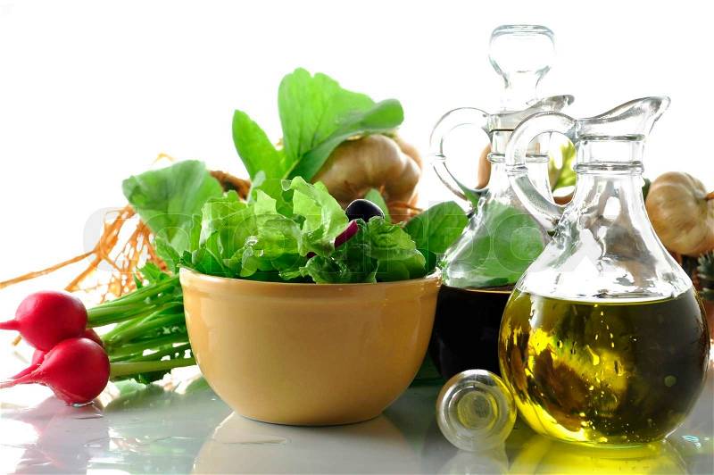 Fresh salad with vinegar and olive oil, stock photo