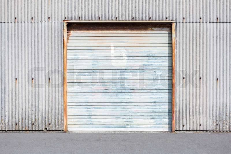 Self Storage Unit Shutter door or roller door of factory building use for industrial background, stock photo