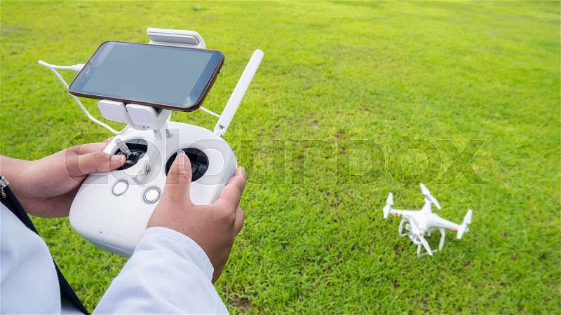 Hand holding on remote for Control drone, stock photo