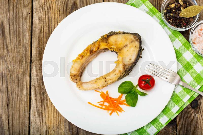 Fried white fish steaks on White Plate. Studio Photo, stock photo