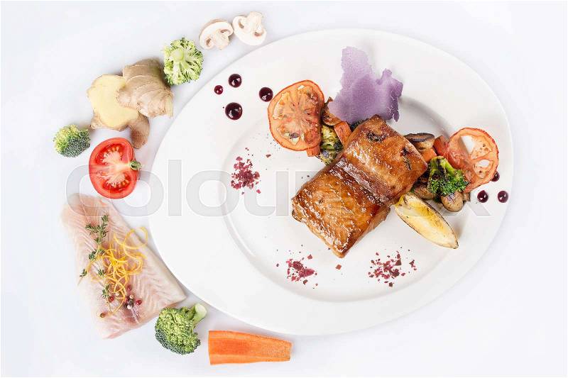 Grilled fish salmon steak on white dish.top view. restaurant food background, stock photo