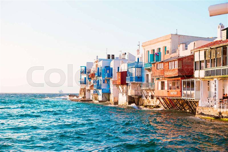 Little Venice the most popular sight in Mykonos Island in soft evening light on Greece, Cyclades, stock photo