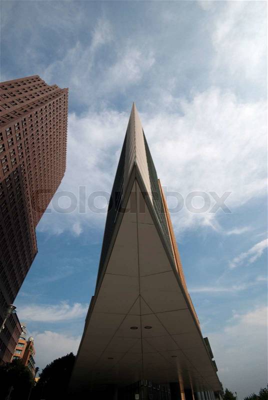 Sharp highrise profile and another building from Potsdamer Platz in Berlin, Germany, stock photo