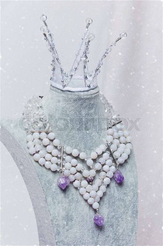 Beautiful set of bridal accessories made from natural stones. Princess crown and necklace, stock photo