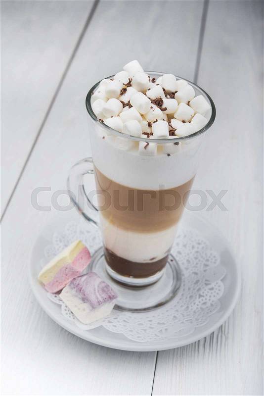 iced coffee frappe in glass on wood table, stock photo
