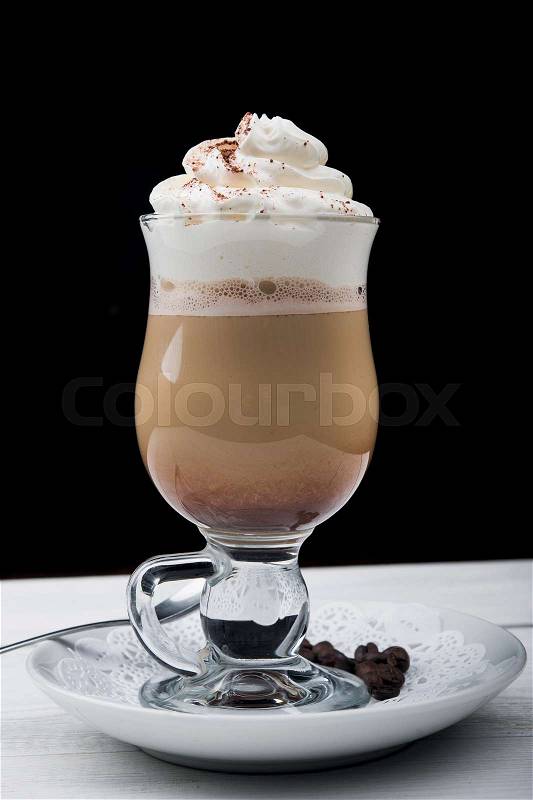 iced coffee frappe in glass on wood table, stock photo