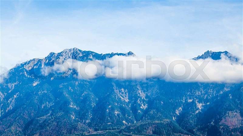 Clouds on mountain tops. Mountain landscape with clouds. mountain landscape, stock photo