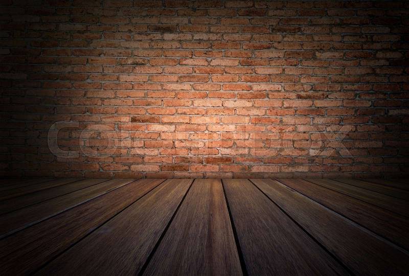 Grunge room with wooden floor and red brick wall background, stock photo