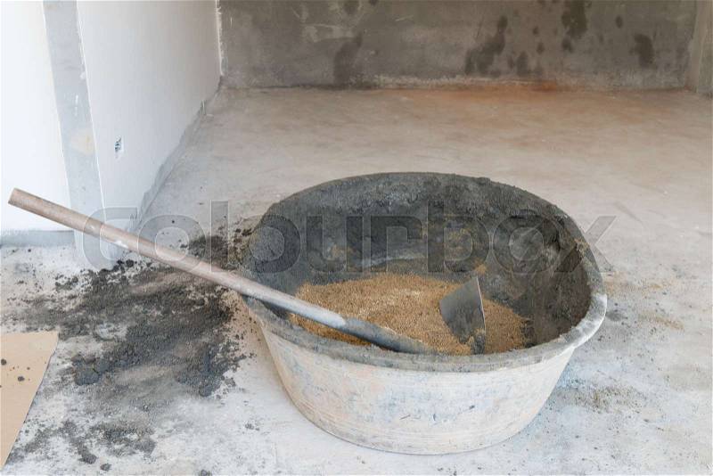 Sand in basket prepared mix cement concrete for plaster wall and floor , stock photo