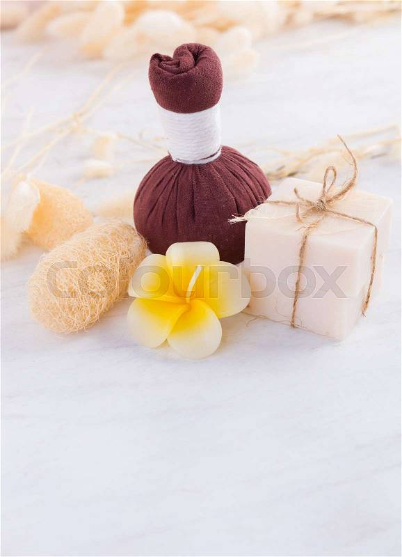 Massage ball and spa aromatherapy products on wooden background, stock photo
