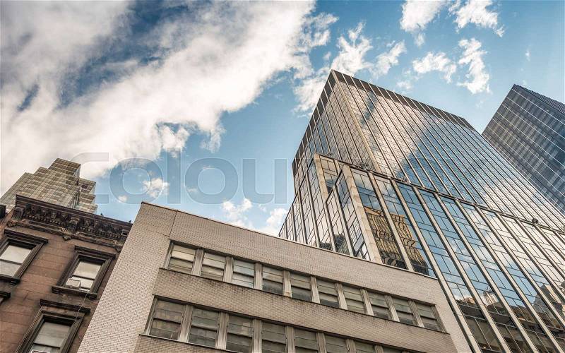 Downtown Manhattan buildings as seen from the street, stock photo