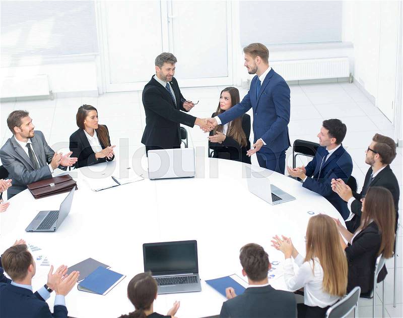 Round table discussion at Business convention and handshake. Aud, stock photo