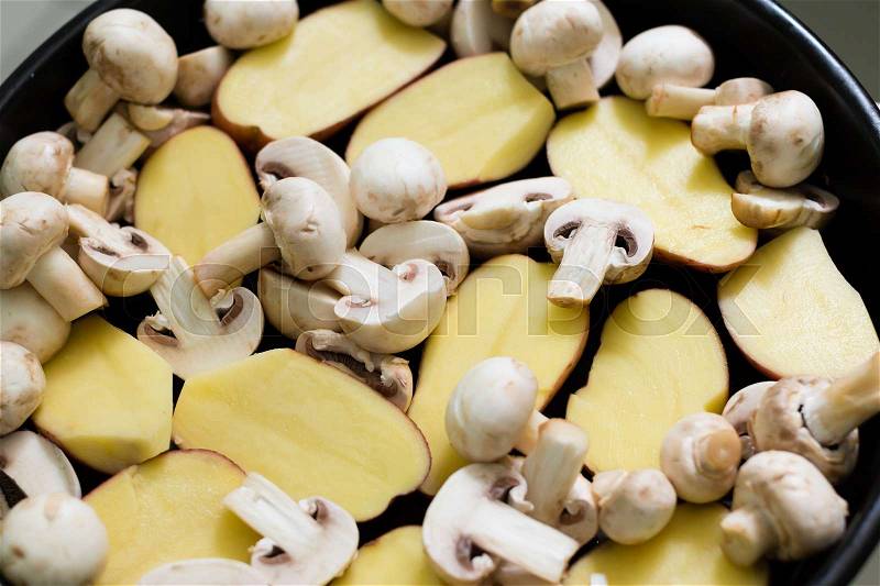 Raw food Mushrooms with Potatoes ready for grill, stock photo
