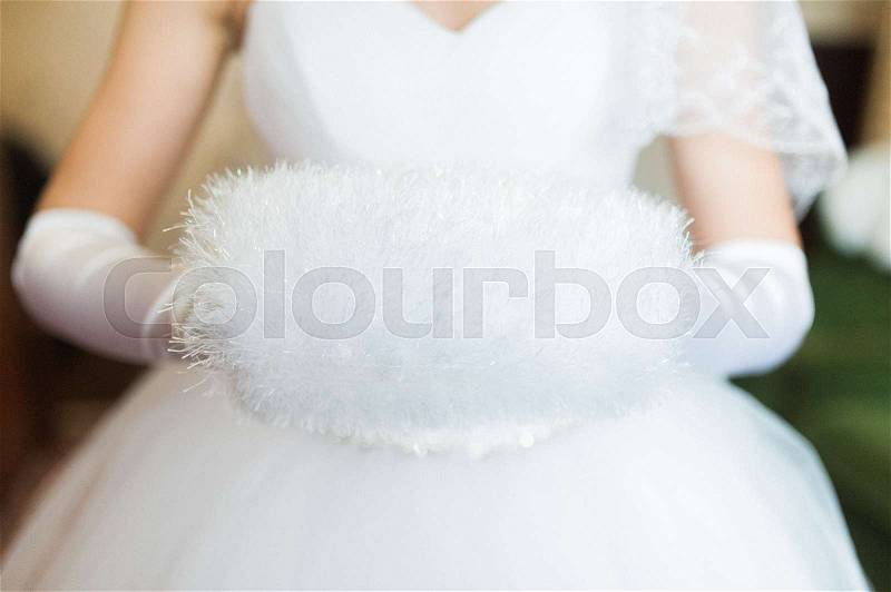 Bride getting dressed on her best day ever. Winter wedding, stock photo