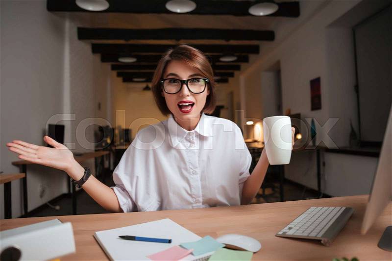 Shocked office woman. looking at the camera, stock photo