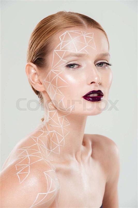 Beautiful portrait of sensual woman with body art. Close up. isolated gray background, stock photo