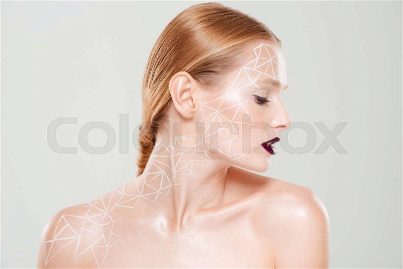 Close up model with body art. Head turned to the left. isolated gray background. Fashion art photo, stock photo