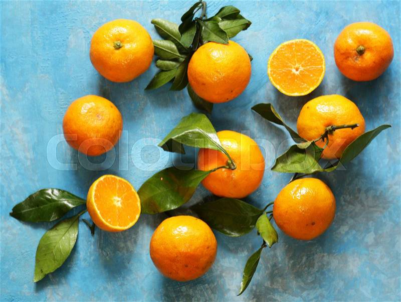 Natural organic tangerine. Ripe orange fruits mandarins, stock photo