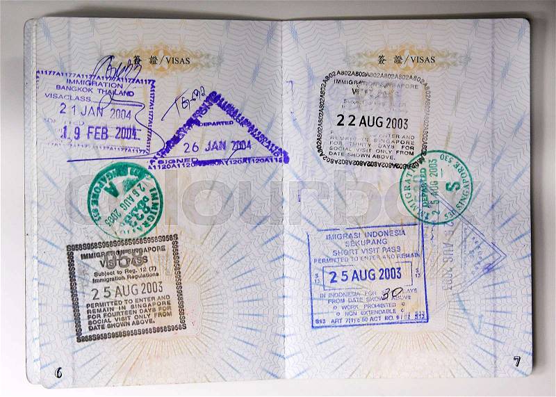 Passport stamps entering Thailand, Singapore and Indonesia, stock photo