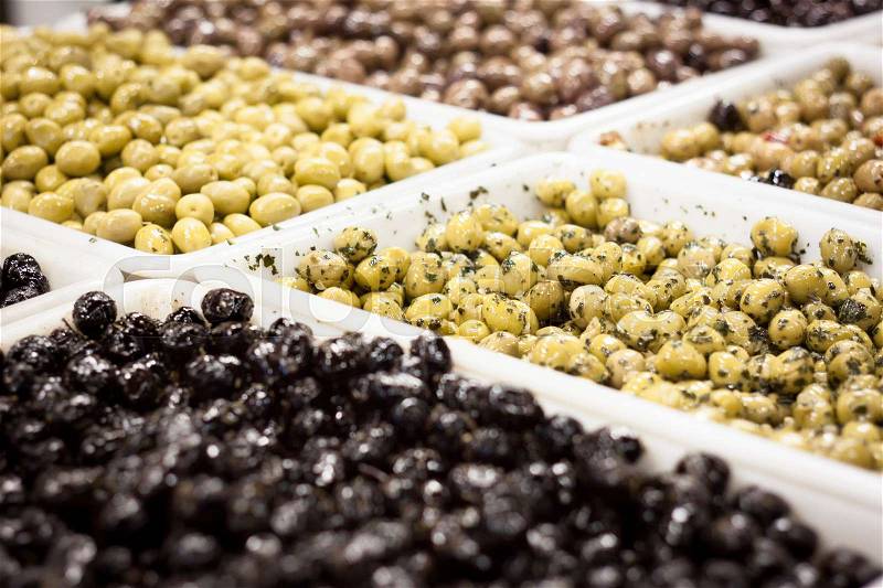 Green and black olives on the market, stock photo