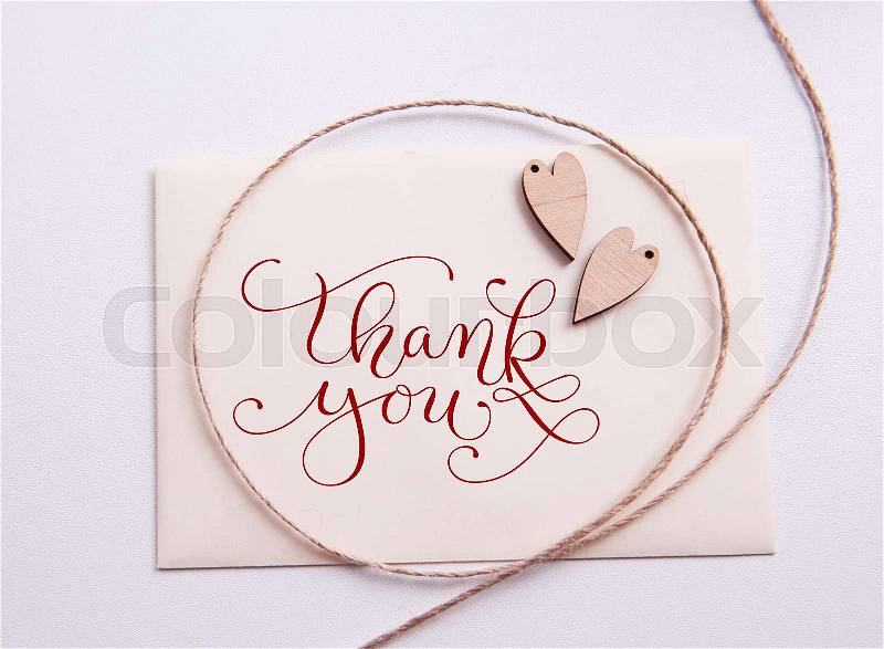 Valentines card with wooden heart and text Thank you, stock photo