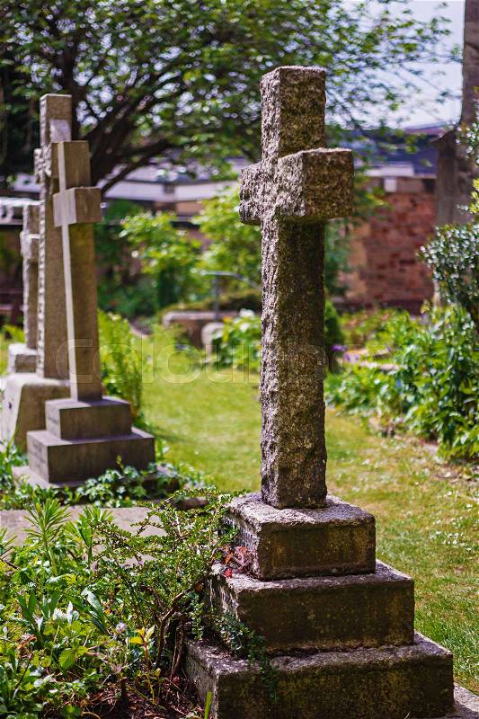 Crosses at churchyard cemetery at Bristol Cathedral in Bristol in South West of the UK. It is fully called as Cathedral Church of the Holy and Undivided Trinity. , stock photo