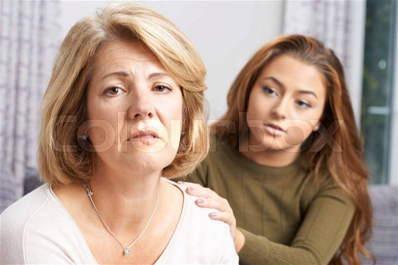 Depressed Mother With Teenage Daughter, stock photo