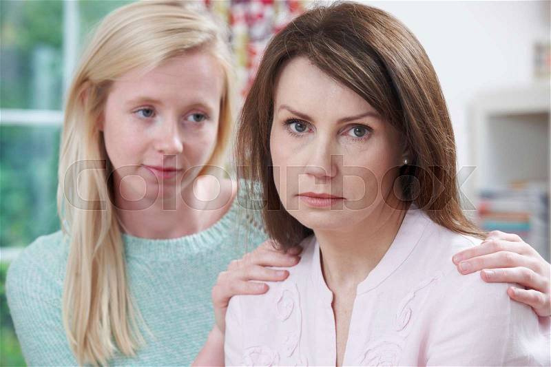 Depressed Mother With Teenage Daughter, stock photo