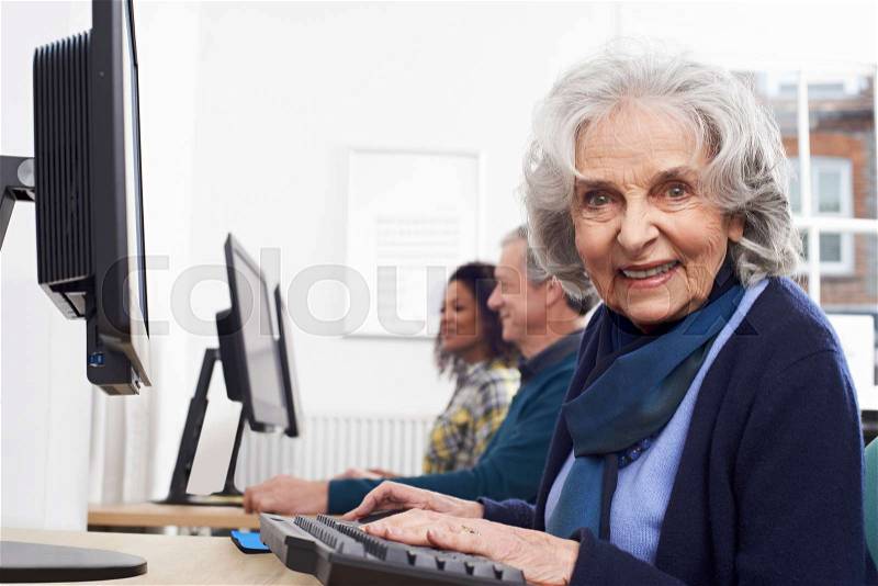 Senior Woman Attending Computer Class, stock photo