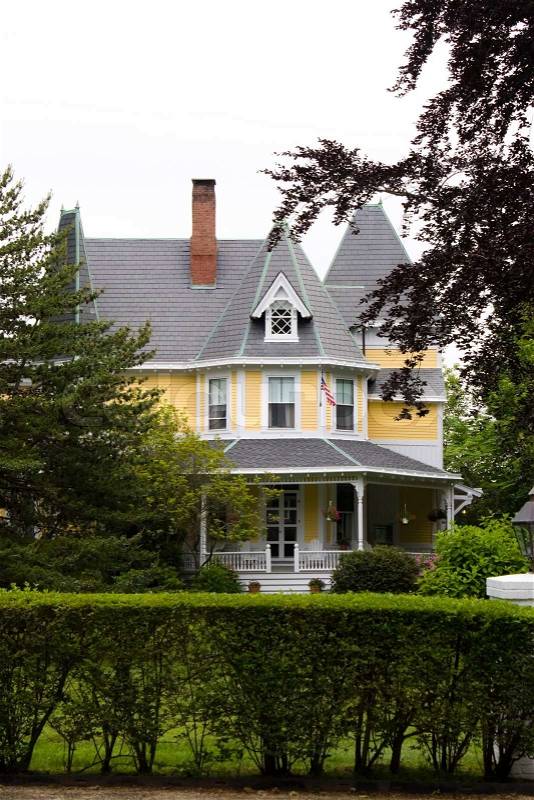 An old Victorian style home with classic architecture, stock photo