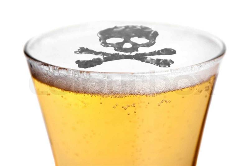 The dangers of alcoholism concept with a skull and cross bones symbol floating on top of the beer, stock photo