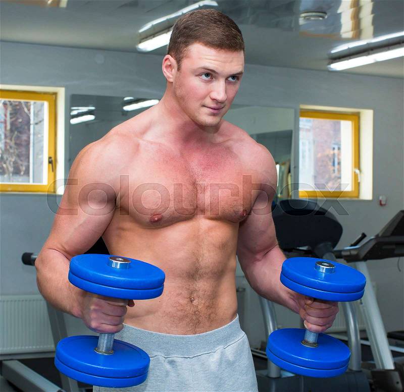 Man engaged in bodybuilding, stock photo