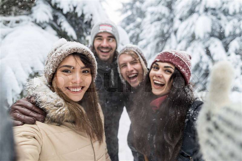 Friends Taking Selfie Photo Smile Snow Forest Young People Group Outdoor Winter Pine Woods, stock photo