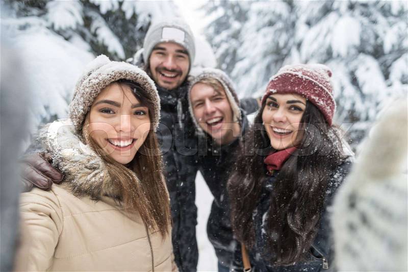 Friends Taking Selfie Photo Smile Snow Forest Young People Group Outdoor Winter Pine Woods, stock photo