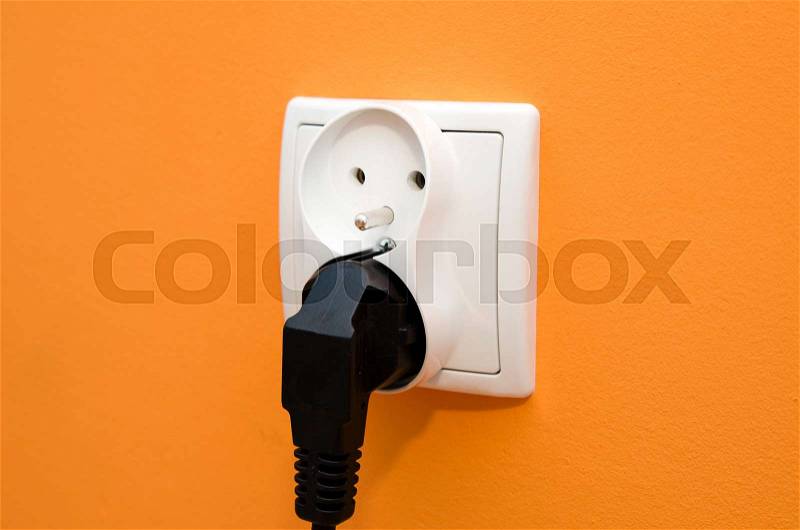 Electrical socket in wall. Electrical bill utilities cost increase rise socket wall composition, stock photo