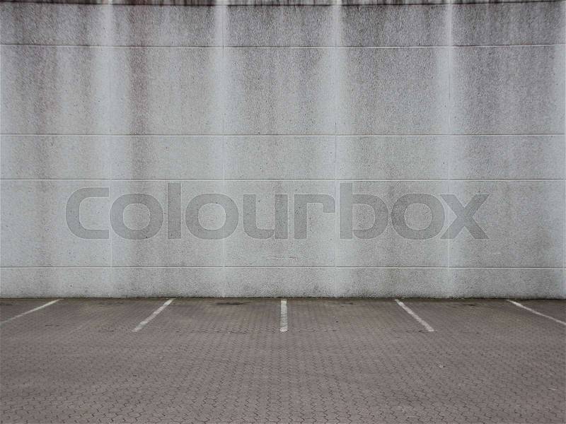Empty Grey Urban Ghetto Parking Lot with Concrete Wall, stock photo